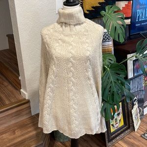 One A cream cable knit poncho sweater
